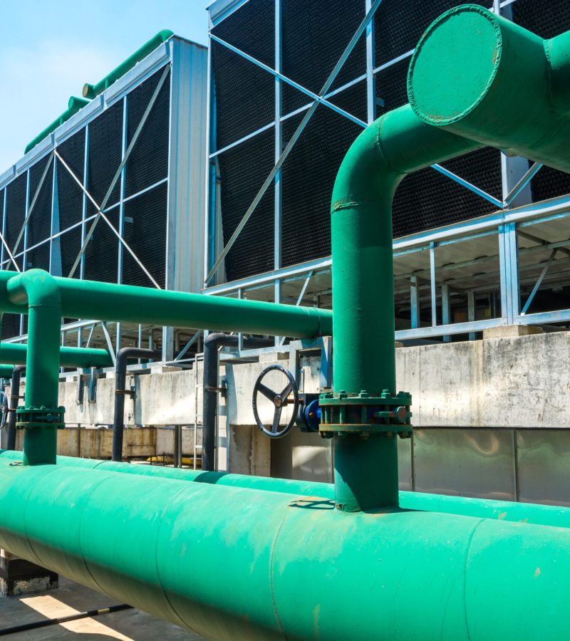 Sets of cooling towers in data center building.